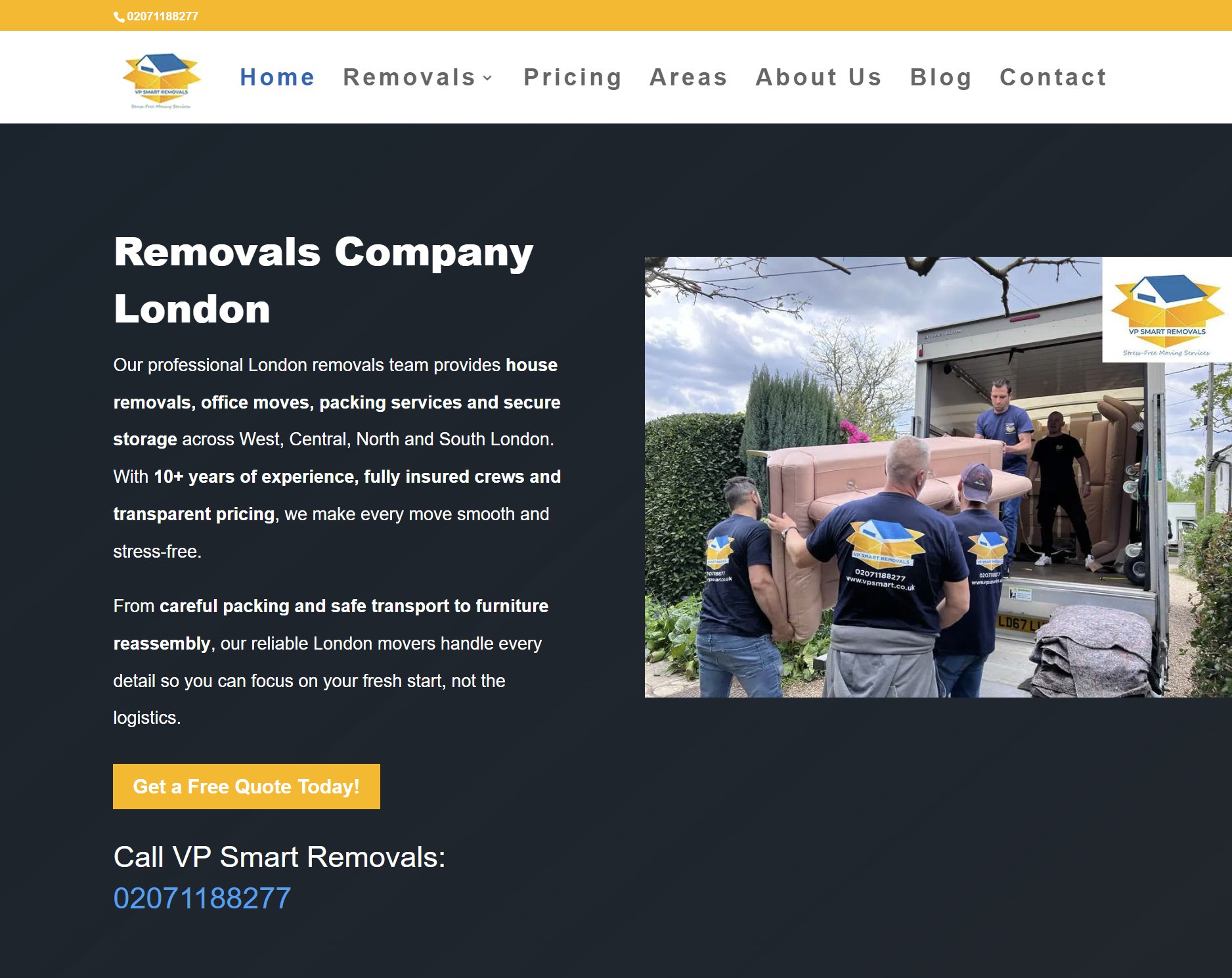 Removals team loading sofa into van in London